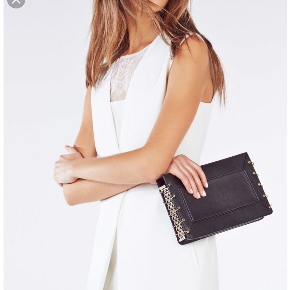 Bcbgmaxazria black leather clutch